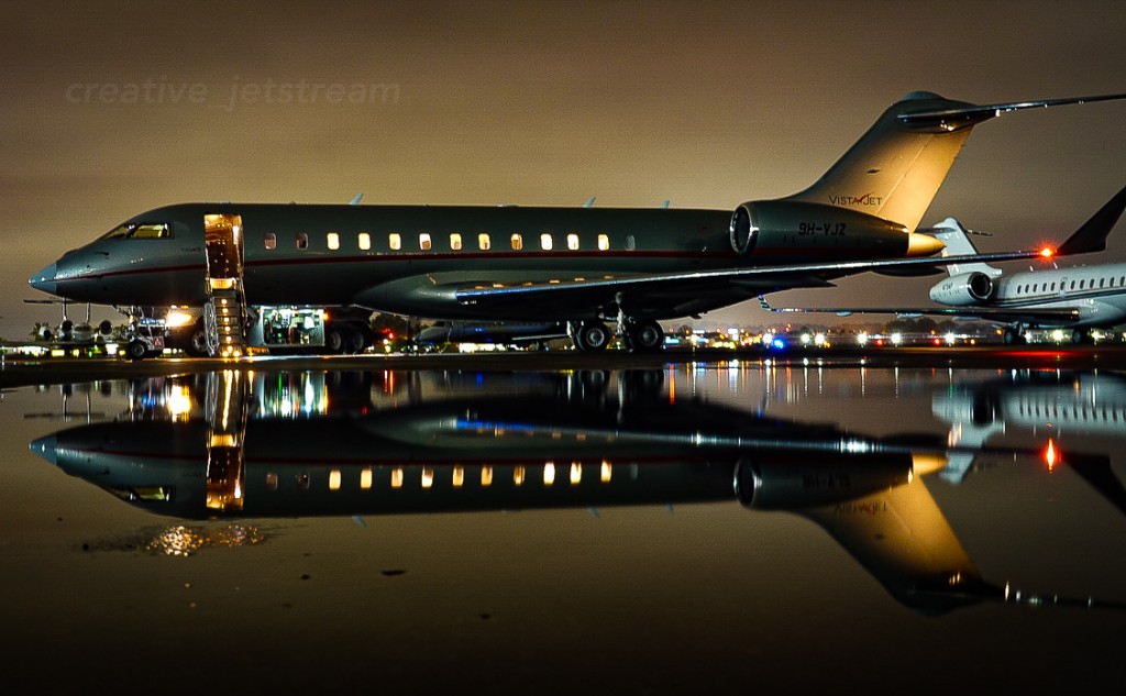 Business jet night reflection